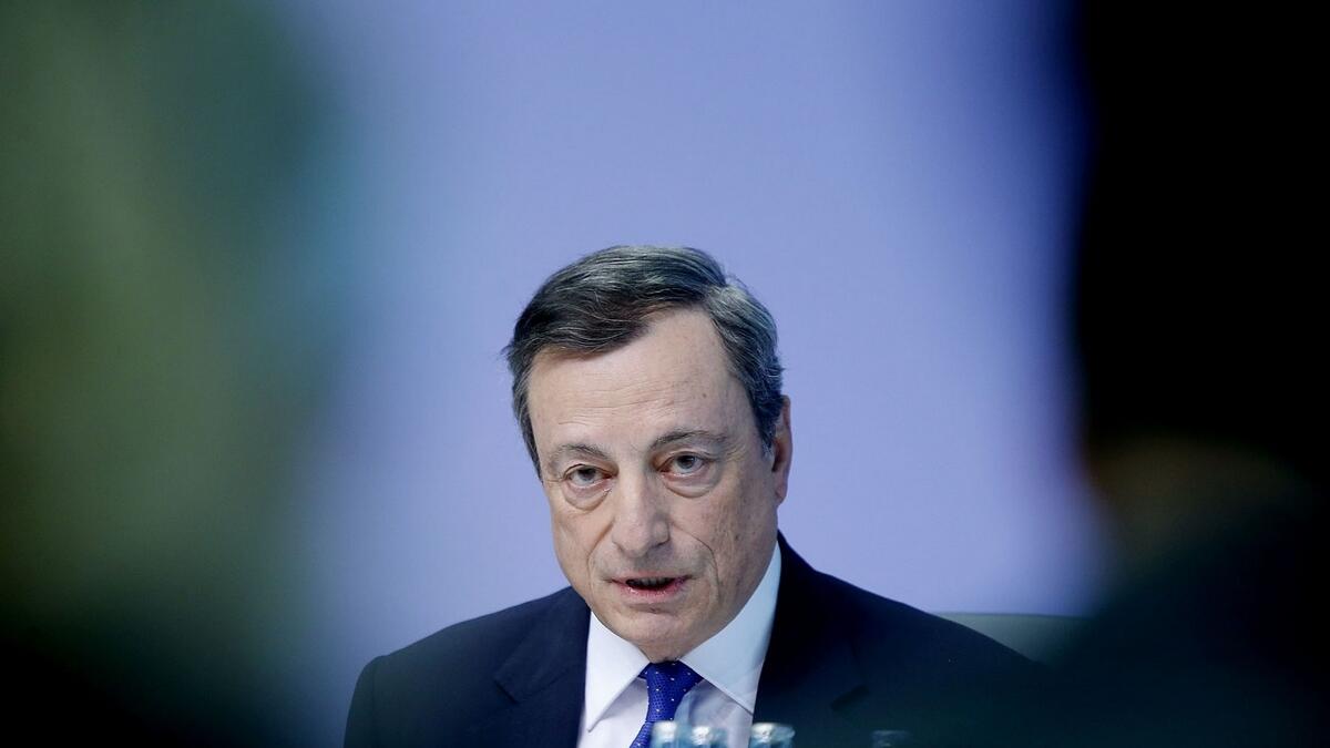 Draghi urges patience on ECBs ultra-easy monetary policy