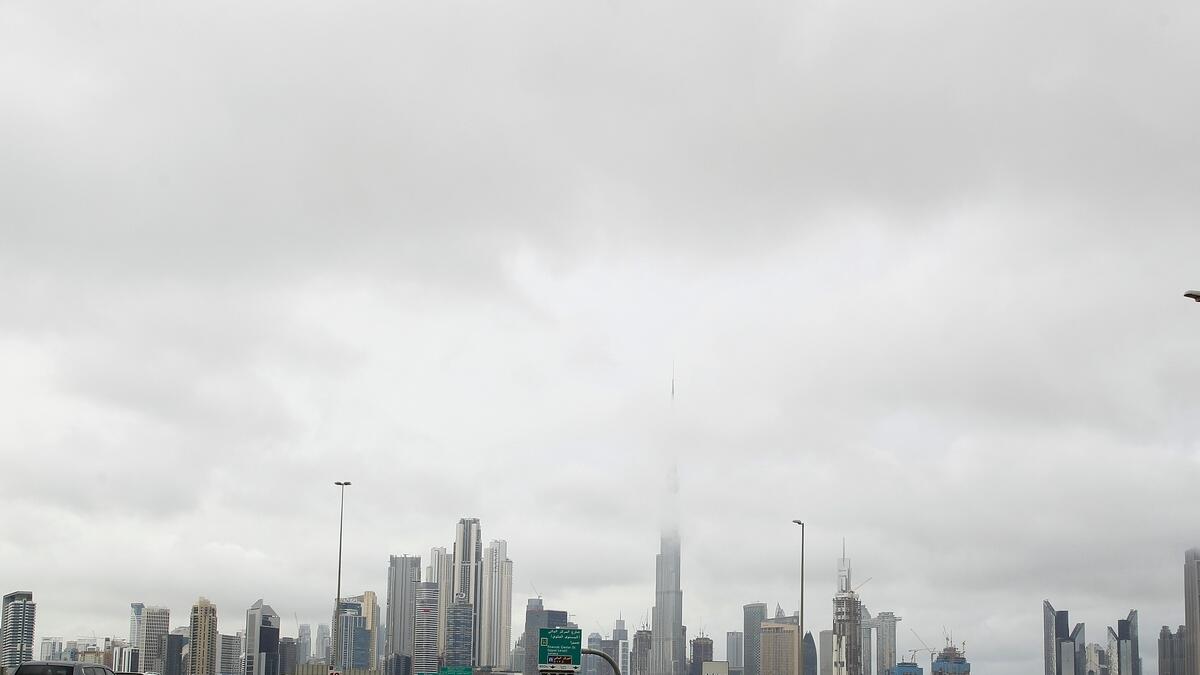 Dubai's iconic skyscraper playing peek-a-boo in the clouds on Wednesday November 20, 2019. Photo by Juidin Bernarrd/Khaleej Times