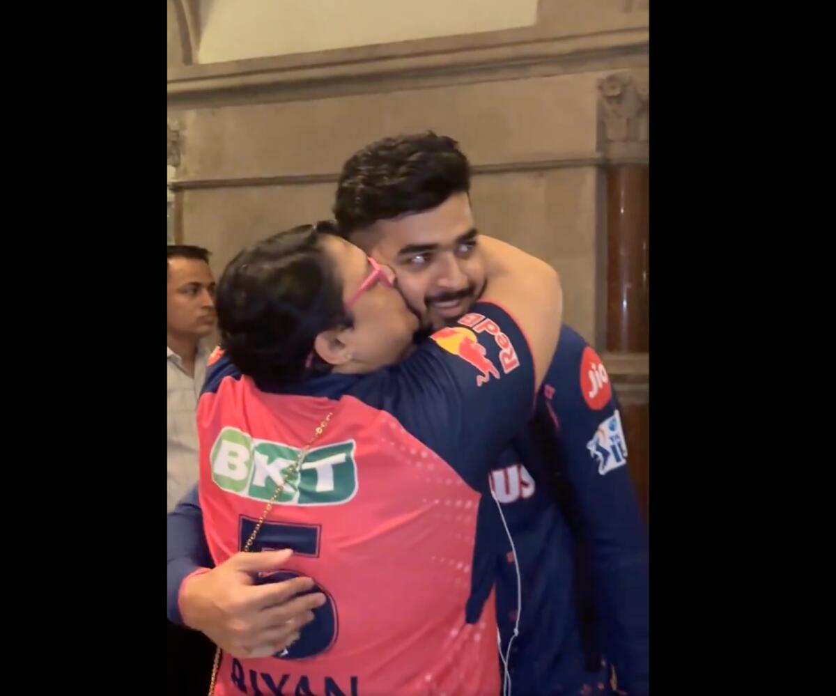 Riyan Parag gets a big hug from his mother after the match against Mumbai. — X