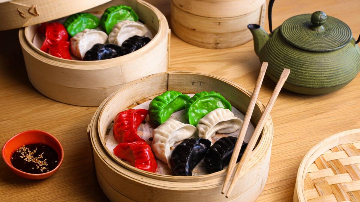 Asian flavour.  By: The Noodle House. If you’re looking for something a bit different The Noodle House is dishing up vegetarian dim sum for Dh49 and guess what? They’ll arrive in the colours of the flag. Surprise! They’ll also be served with Szechuan chili sauce.