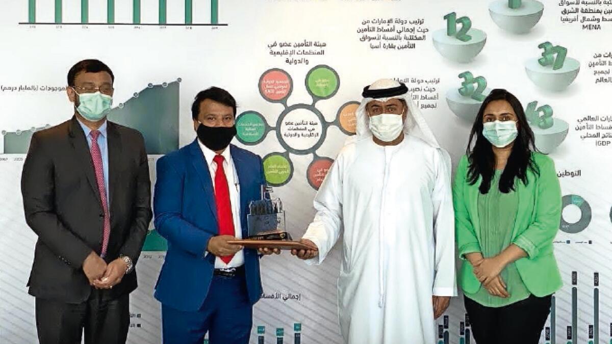 Ebrahim Obaid Al Zaabi, Director General of Insurance Authority, UAE, honours Dr. K.P. Hussain, Chairman – FMC Network UAE for 'Best Medical Insurance TPA' for 2020