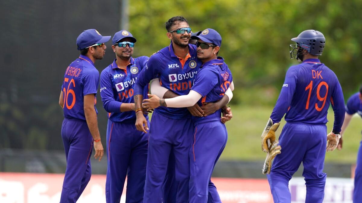 India's Axar Patel celebrates with his teammates. — AP