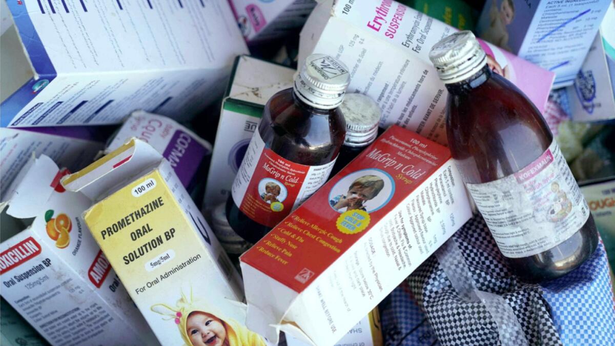 A photograph shows collected cough syrups in Banjul, Gambia. — AFP