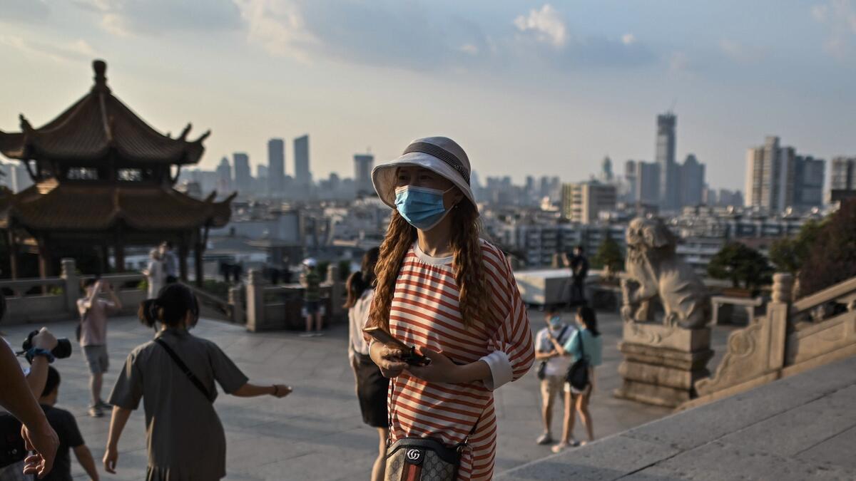 Tourists wearing face masks visit the Yellow Crane Tower in Wuhan, China's central Hubei province during a media visit organised by local authorities. Photo: AFP