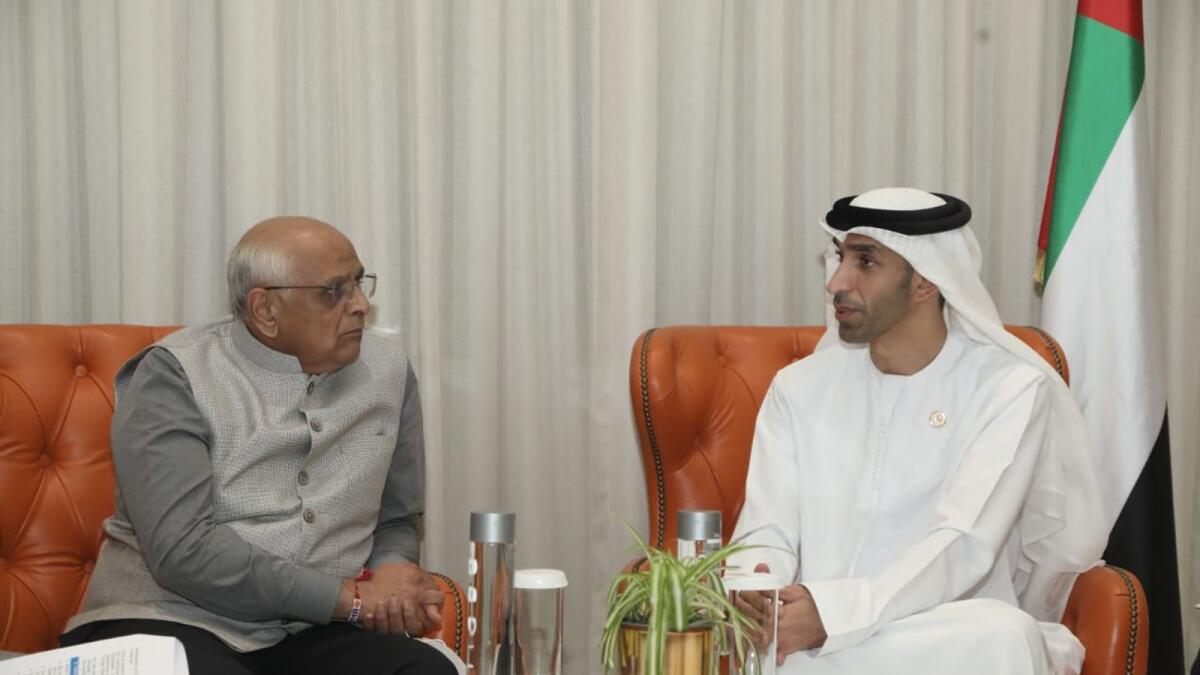 Dr Thani bin Ahmed Al Zeyoudi, UAE Minister of State for Foreign Trade, receives Bhupendra Patel, Chief Minister of Gujarat at World Expo 2020 Dubai on Wednesday. Photo: Supplied