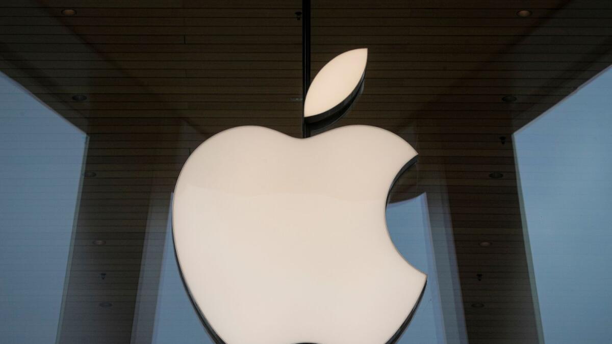 The Apple logo is seen at an Apple Store. — Reuters file