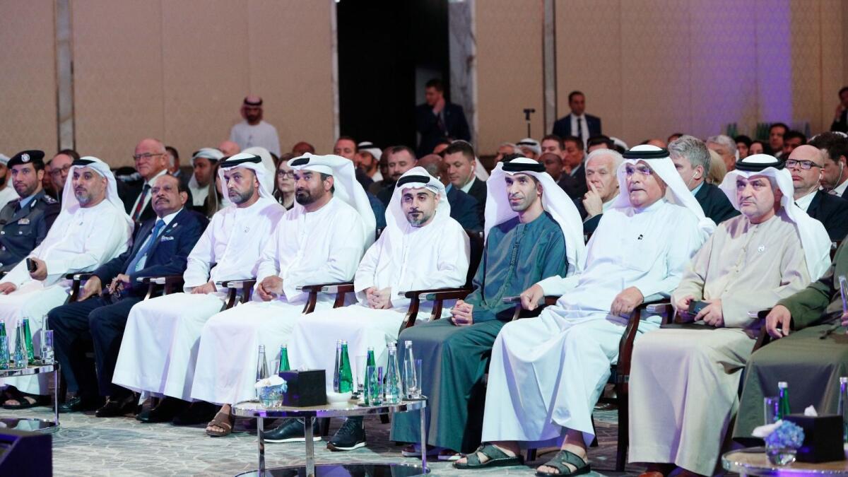 Dr Thani bin Ahmed Al Zeyoudi, UAE Minister of State for Foreign Trade; Yusuffali M.A; chairman of Lulu Group, and other guests at the event in Abu Dhabi on Thursday. Abu Dhabi Chamber of Commerce and Industry has launched a three-year strategy to promote the private sector to realise its true potential and contribute to Abu Dhabi’s economy. — Supplied photos