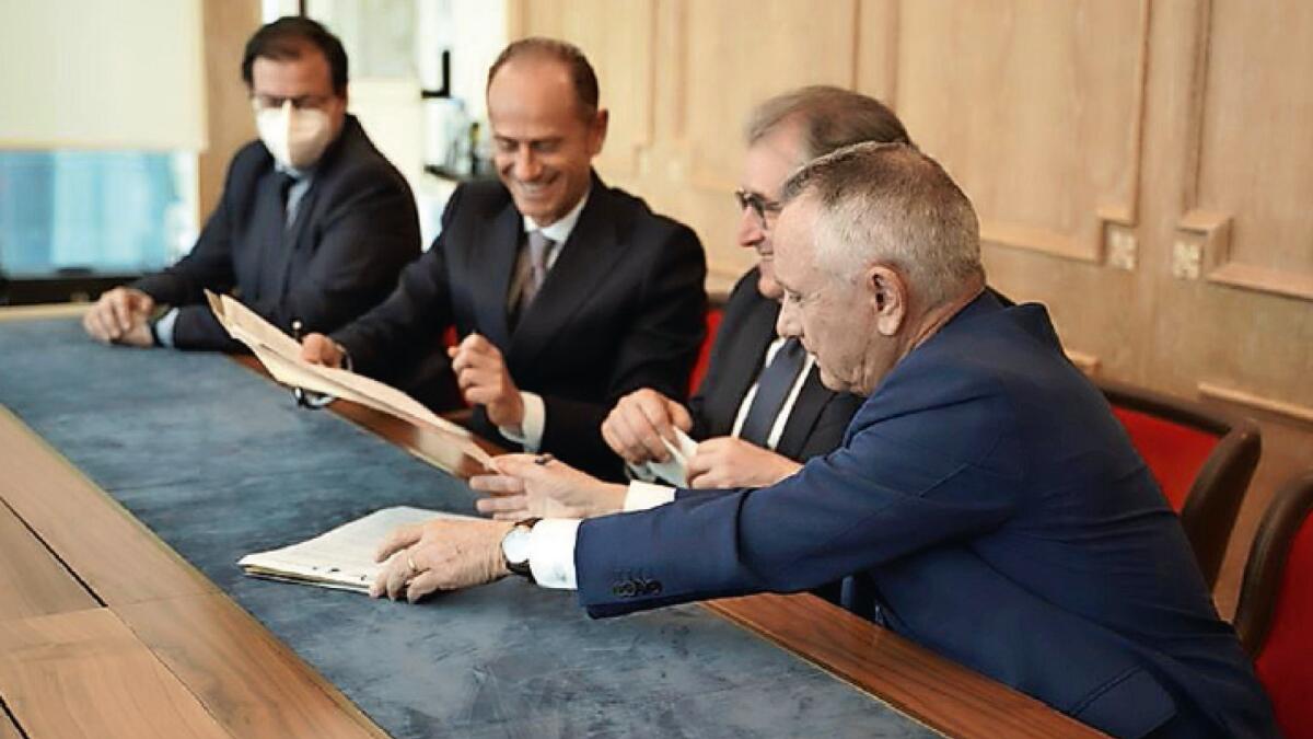The signing of the agreement for the establishment of the 'Abruzzo Region Representative Desk in the UAE'. From right: Mauro Marzocchi, Secretary General of IICUAE; Daniele D'Amario, Regional Councillor; and Stefano Cianciotta, President of Abruzzo Sviluppo.