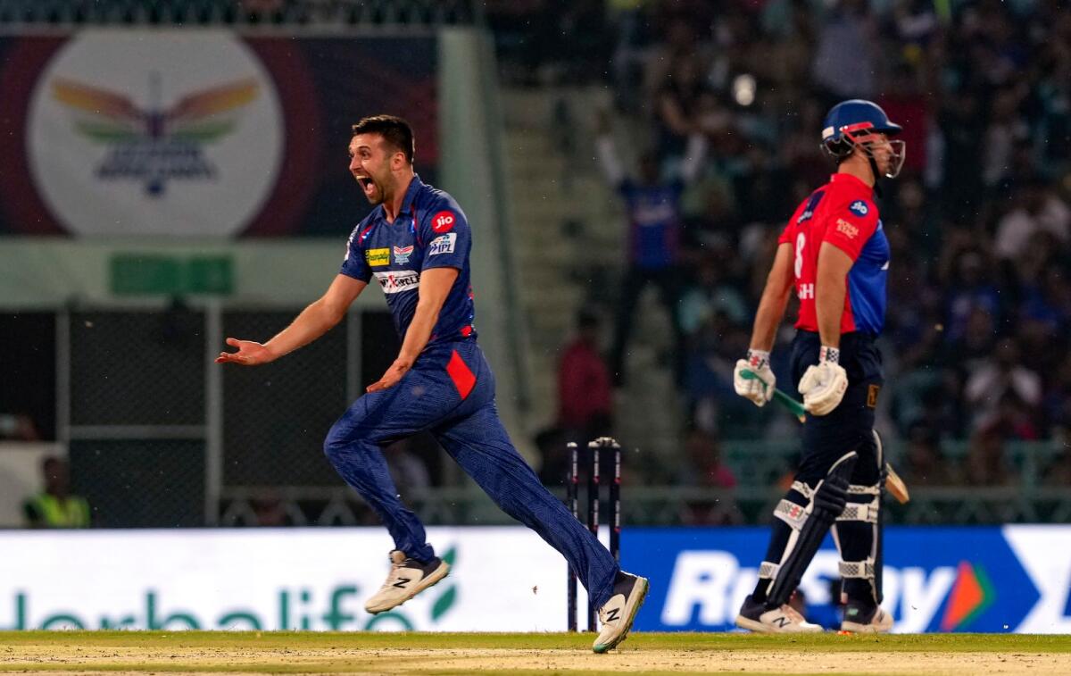Lucknow Super Giants' Mark Wood celebrates after dismissing Mitchell Marsh. — PTI