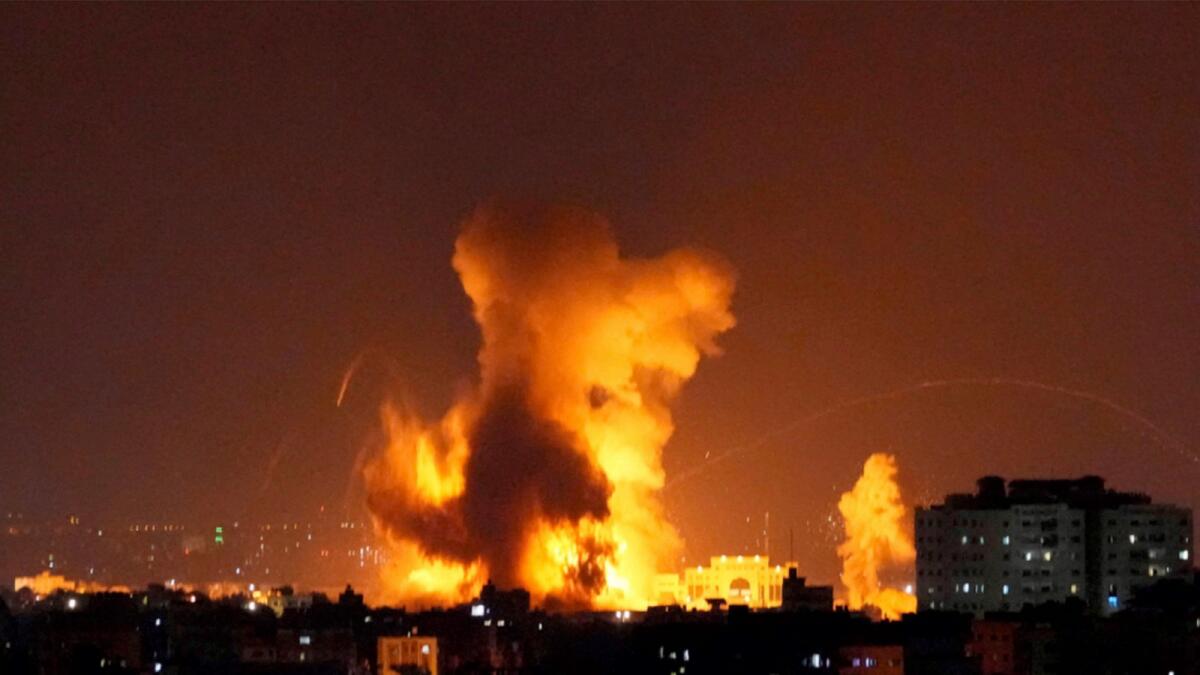 Smoke rises following Israeli airstrikes on a building in Gaza City. — AP