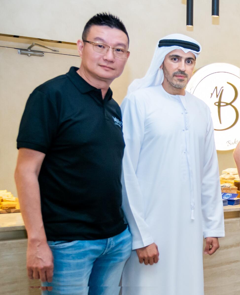 Mohammad Al Hammadi, the owner of Bake n More, and Meng Chan Shu, global ambassador of Mixin Network (Supplied photo)