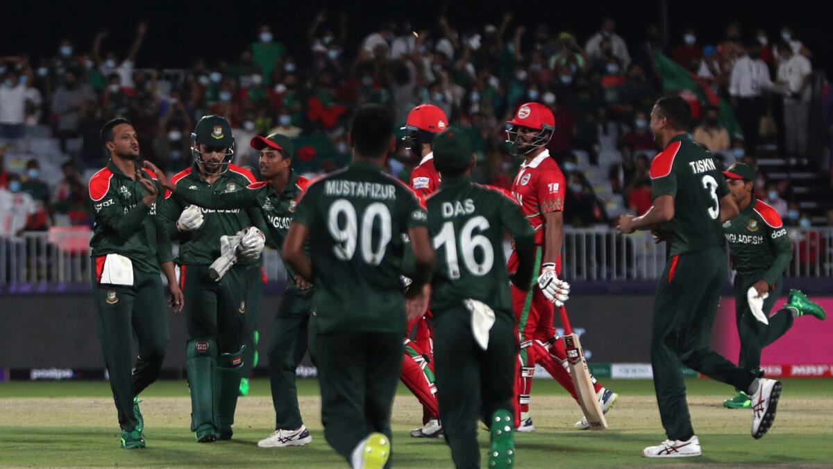 Bangladesh players celebrate his dismissal of Oman's batsman Jatinder Singh. (AP)