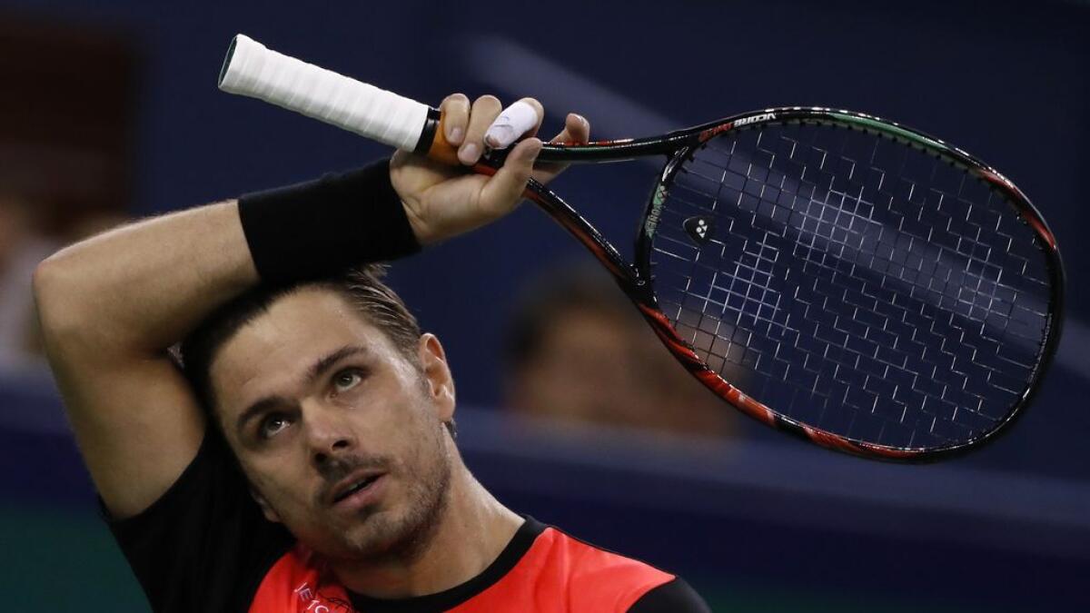 US Open champion Wawrinka stunned; Djokovic, Murray win