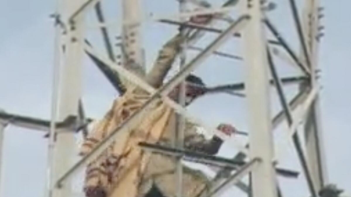 Man climbs mobile tower in Pakistan, demands Prime Minister post