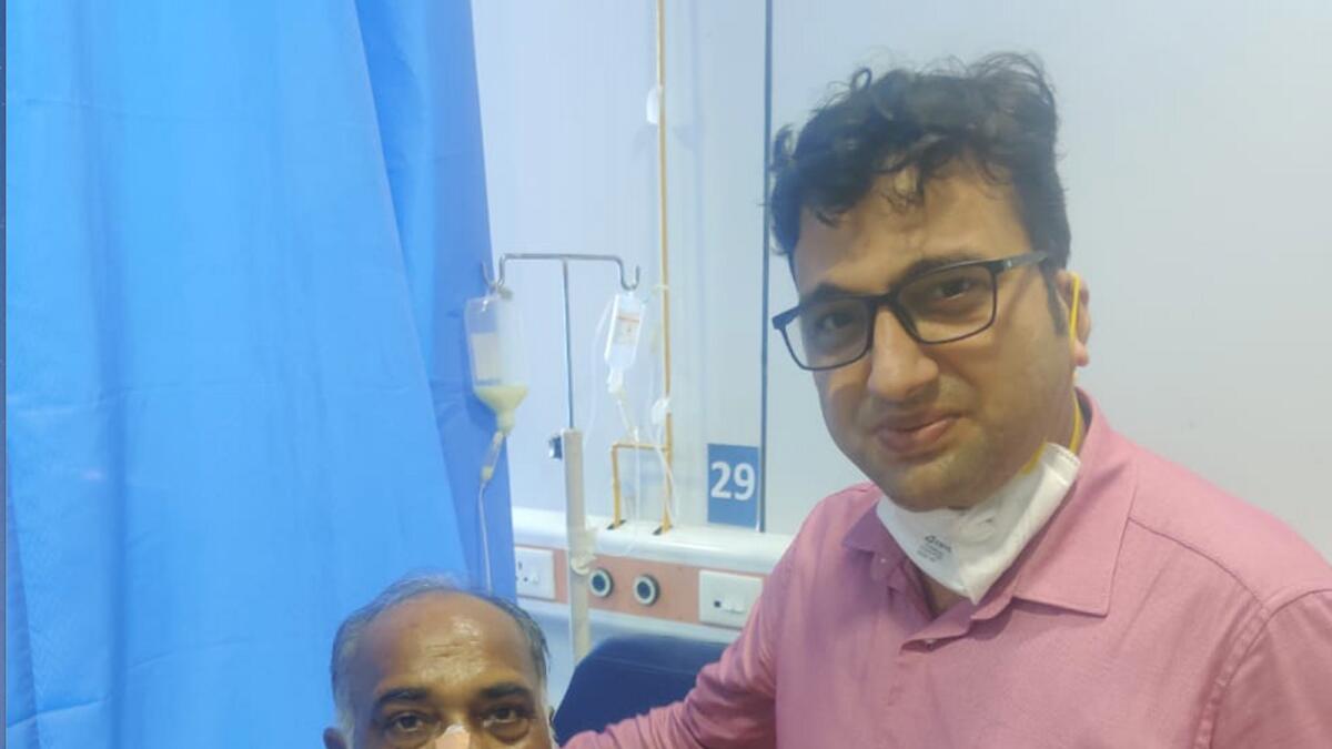 Dr Shashikant Mhashal, assistant professor, ENT, Cooper Hospital, Mumbai, with a Covid-19 patient, who is recovering from mucormycosis. Supplied photo.