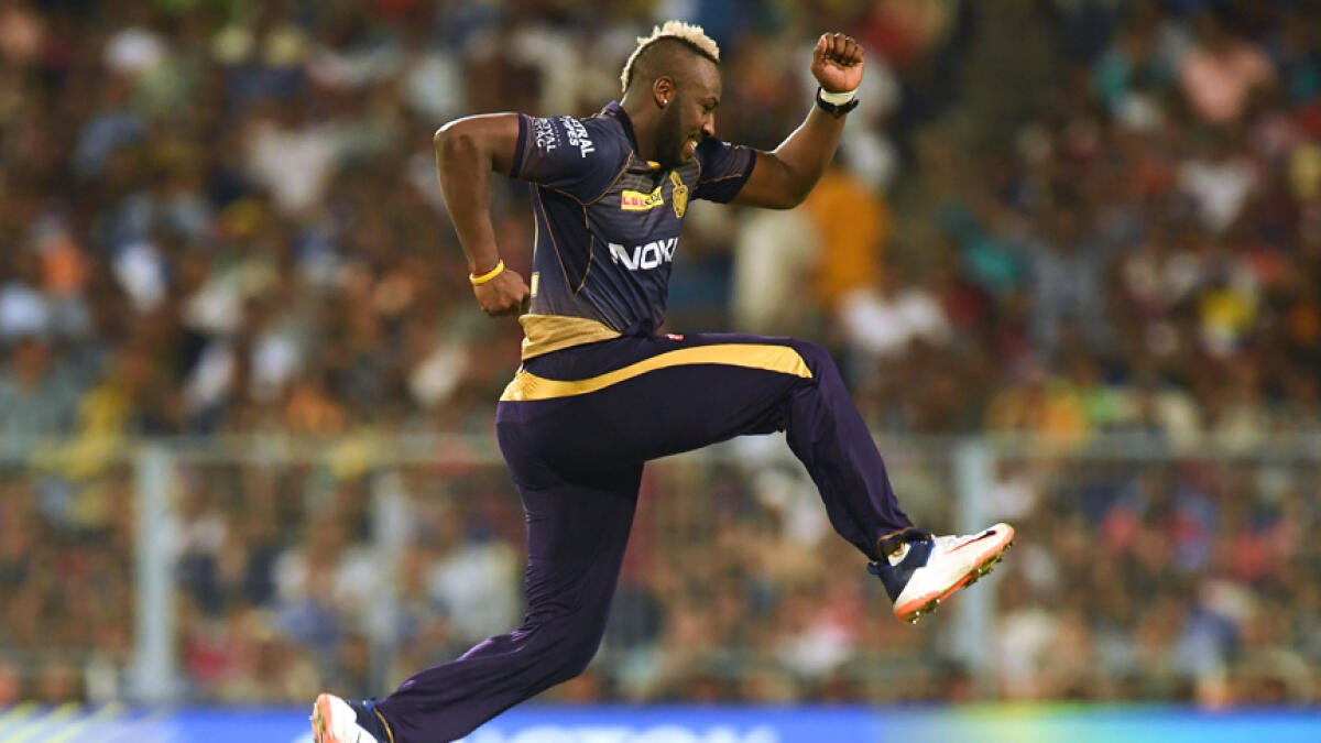 Russell rules the roost as KKR beat MI to stay alive