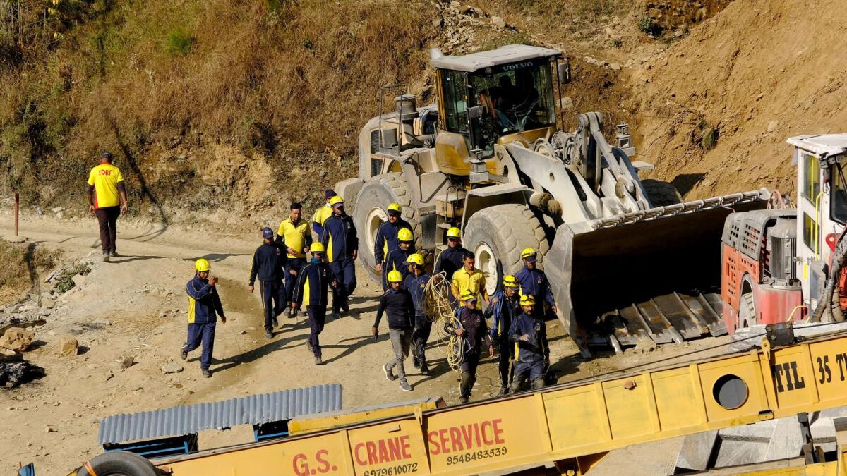 Rescue members from State Disaster Response Force (SDRF) arrive at the tunnel where workers are trapped after the tunnel collapsed in Uttarkashi, in the northern state of Uttarakhand, India, on Thursday. — Reuters