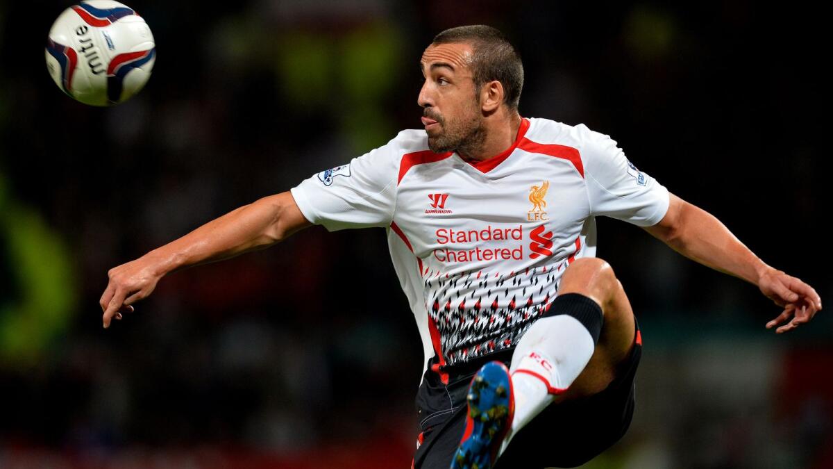Jose Enrique, who made 99 appearances for Liverpool, says Jurgen Klopp will stay as coach at Anfield for a long time. — AFP file