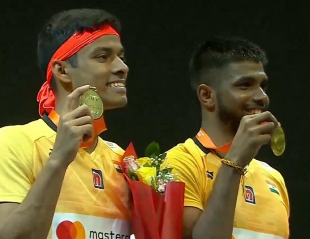 Satwiksairaj Rankireddy and Chirag Shetty celebrate their win. — Twitter