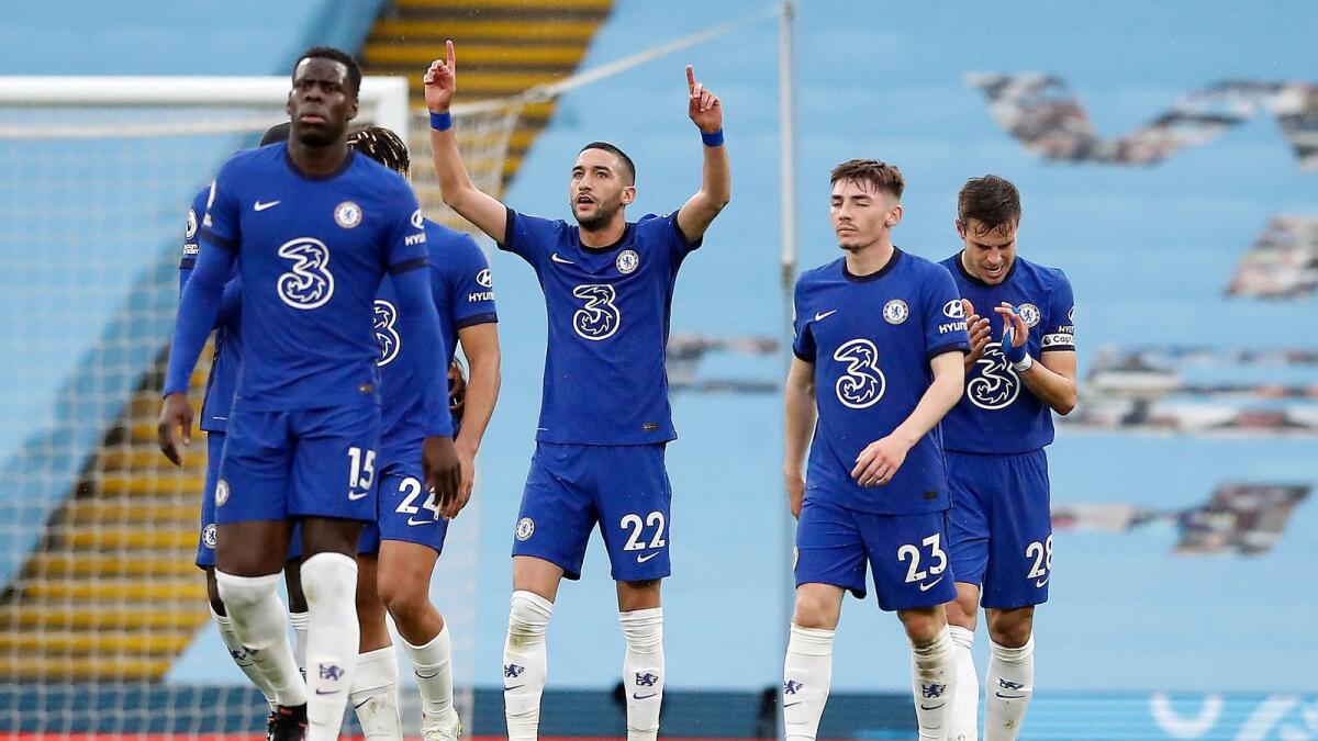Chelsea's Hakim Ziyech (centre) celebrates his goal during the English Premier League match against Manchester City. — AP