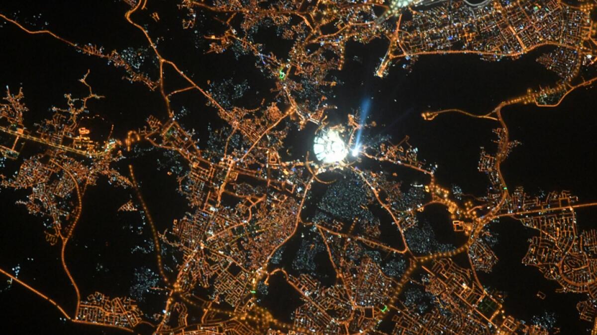 Photos: Day or night, Makkahs Grand Mosque shines from space