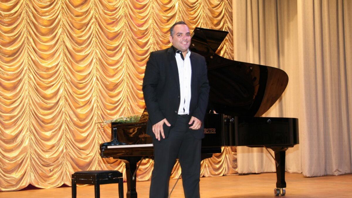 Johnny Hachem is hosting a piano concert to promote peace