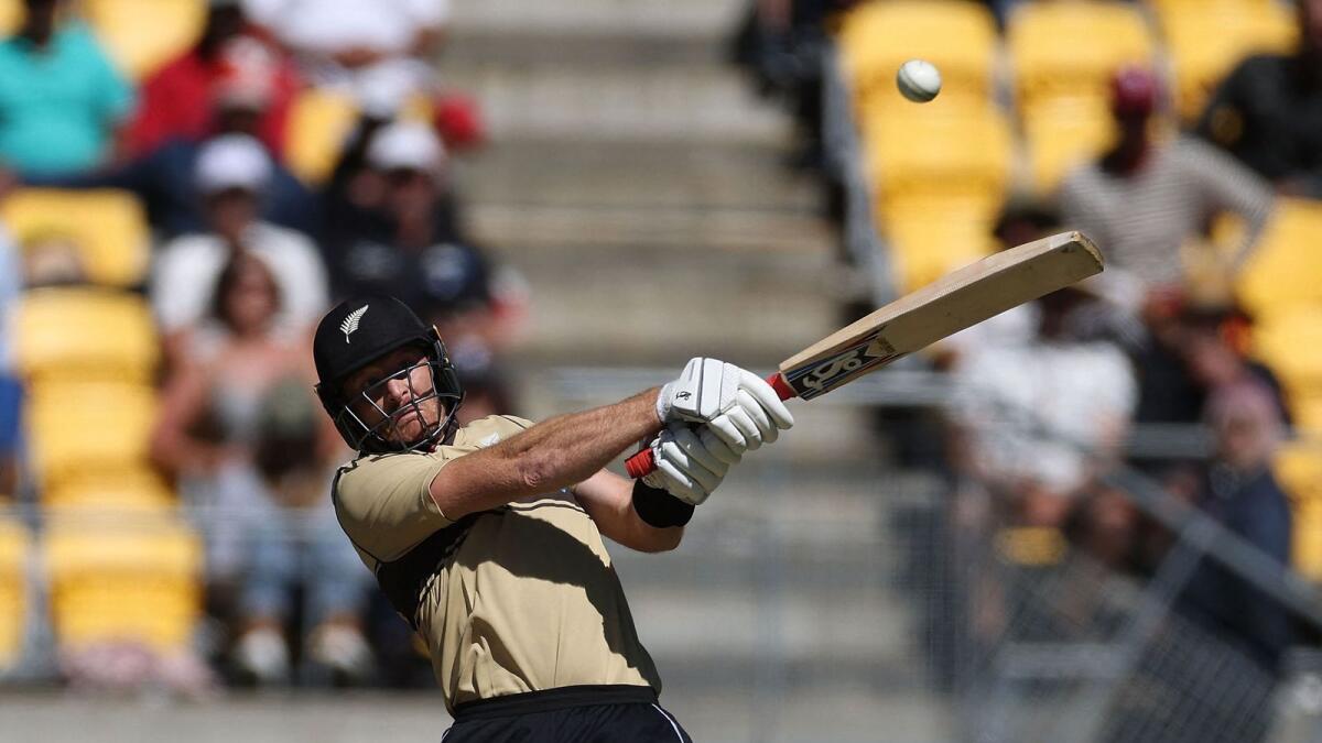 New Zealand's Martin Guptill plays a shot during the fifth Twenty20 cricket match against Australia in Wellington. — AFP