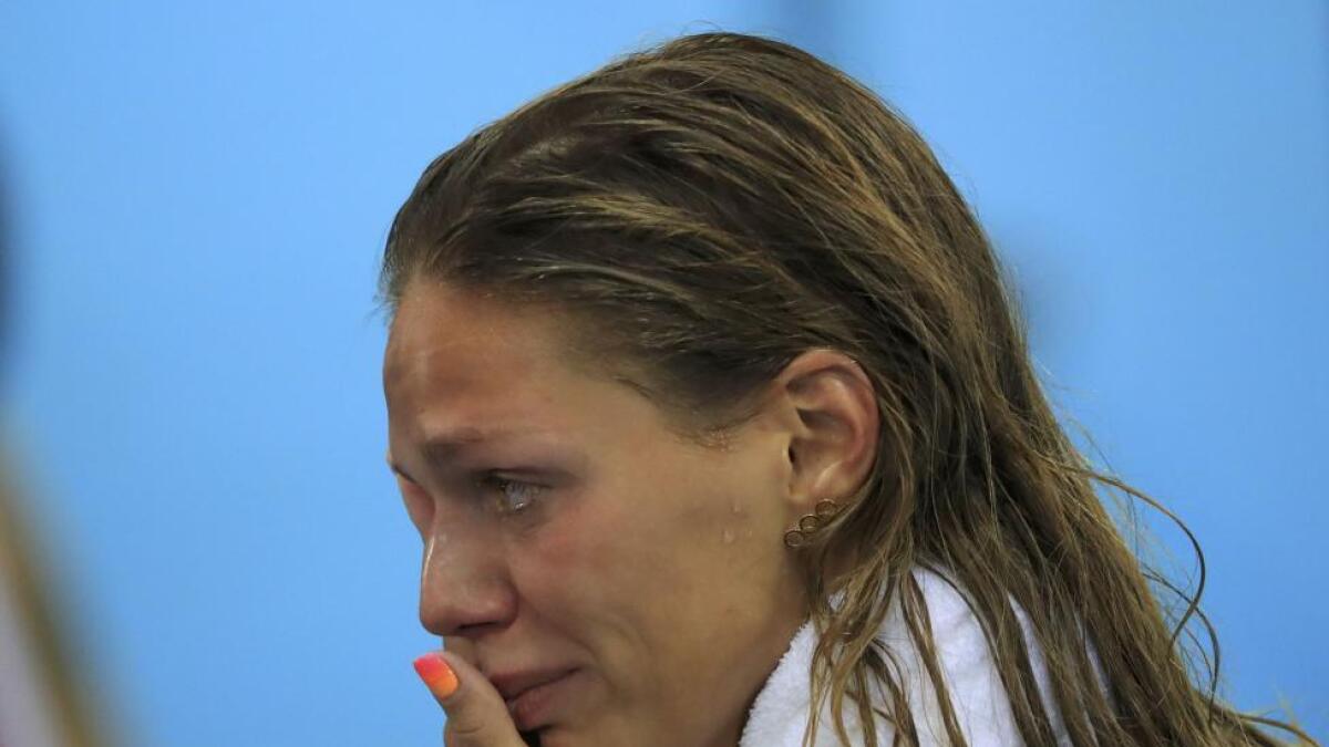 Yulia Efimova of Russia cries after taking silver in the women's 100m breaststroke final.   Reuters