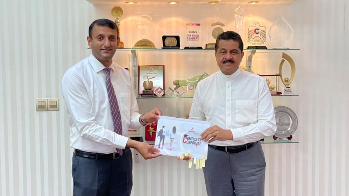 Dr Thumbay Moideen  and Suraj Padmanabhan at the launch of  the Internship Programme Booklet. — Supplied photo