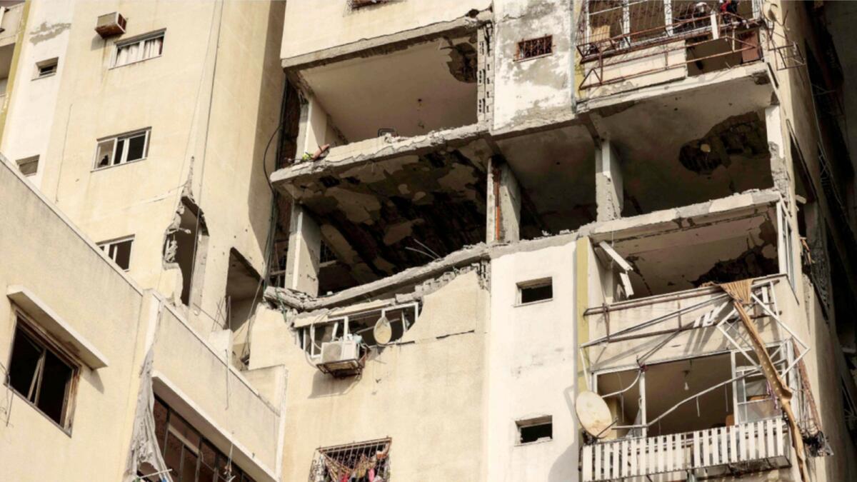 This picture shows the damage caused by an Israeli air strike in the 'Palestine building' in on Gaza City. — AFP