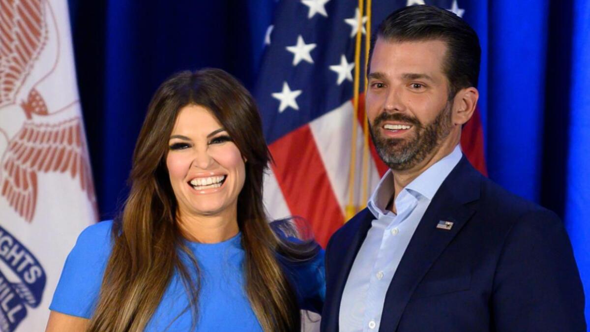 Donald Trump Jr. (R) and his girlfriend Kimberly Guilfoyle smile during a 'Keep Iowa Great' press conference in Des Moines, IA. Donald Trump Jr's his girlfriend Kimberly Guilfoyle tested positive for the coronavirus US media reported. Photo: AFP