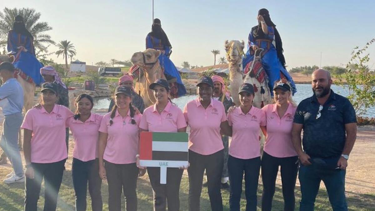 The UAE Ladies' and UAE Girls's Teams at the opening ceremony of the Pan Arab Ladies and Junior Championships with UAE coaches April Varney (second from right) and Faycal Serghini (right) at Riyadh Golf Club.- Supplied photo