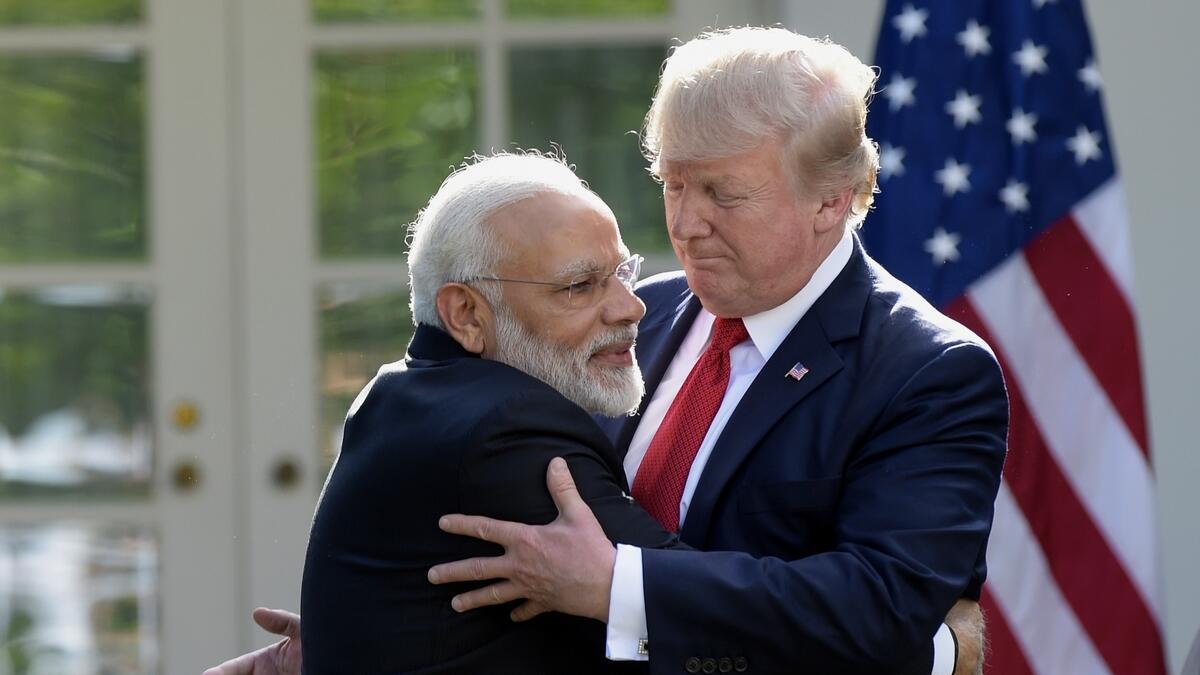 US President Donald Trump and Indian Prime Minister Narendra Modi, left, hug while making statements in the Rose Garden of the White House in Washington.- AP file photo