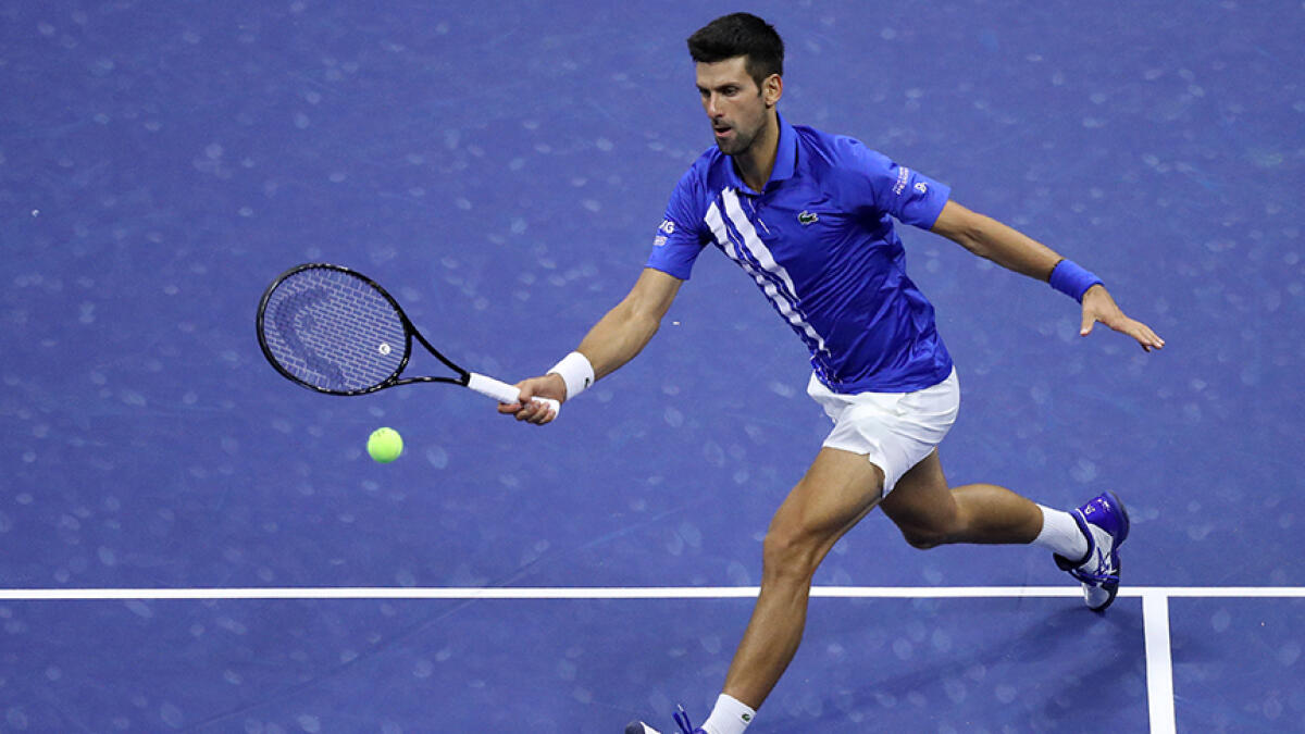 Novak Djokovic returns a volley during his third round match against Jan-Lennard Struff of Germany. -- AFP