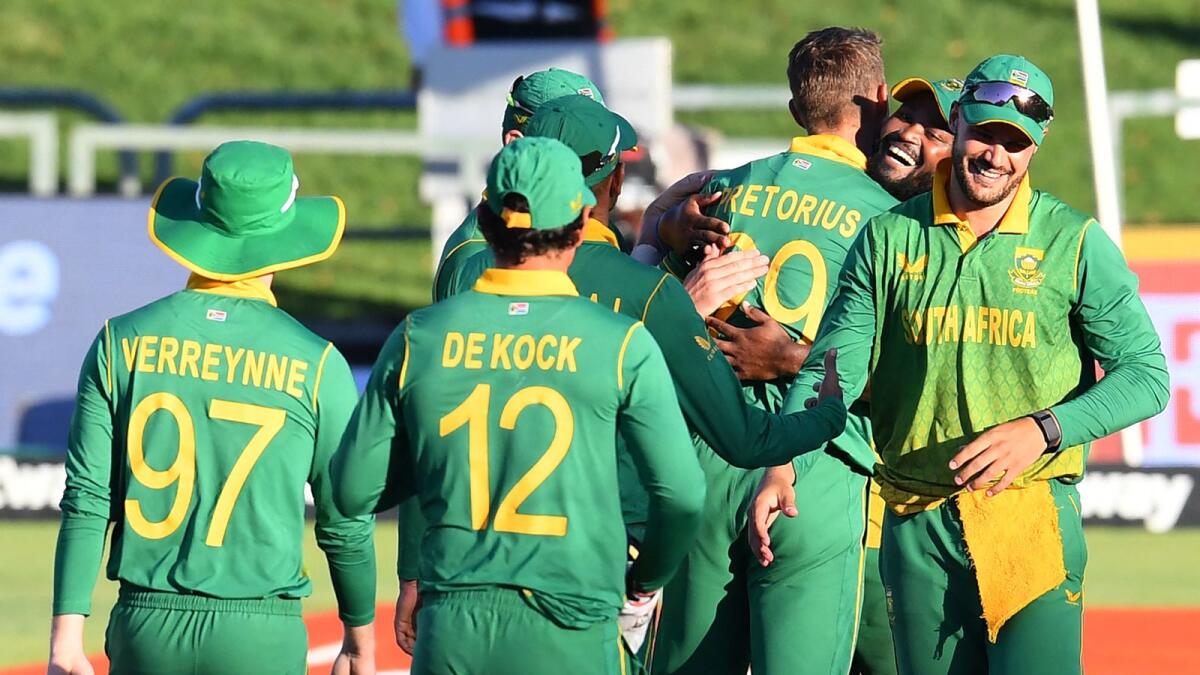 South African players celebrate after their victory in the third one-day international against India. (AFP)