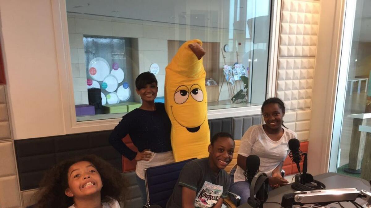 Kids visit the Pearl 102FM studio