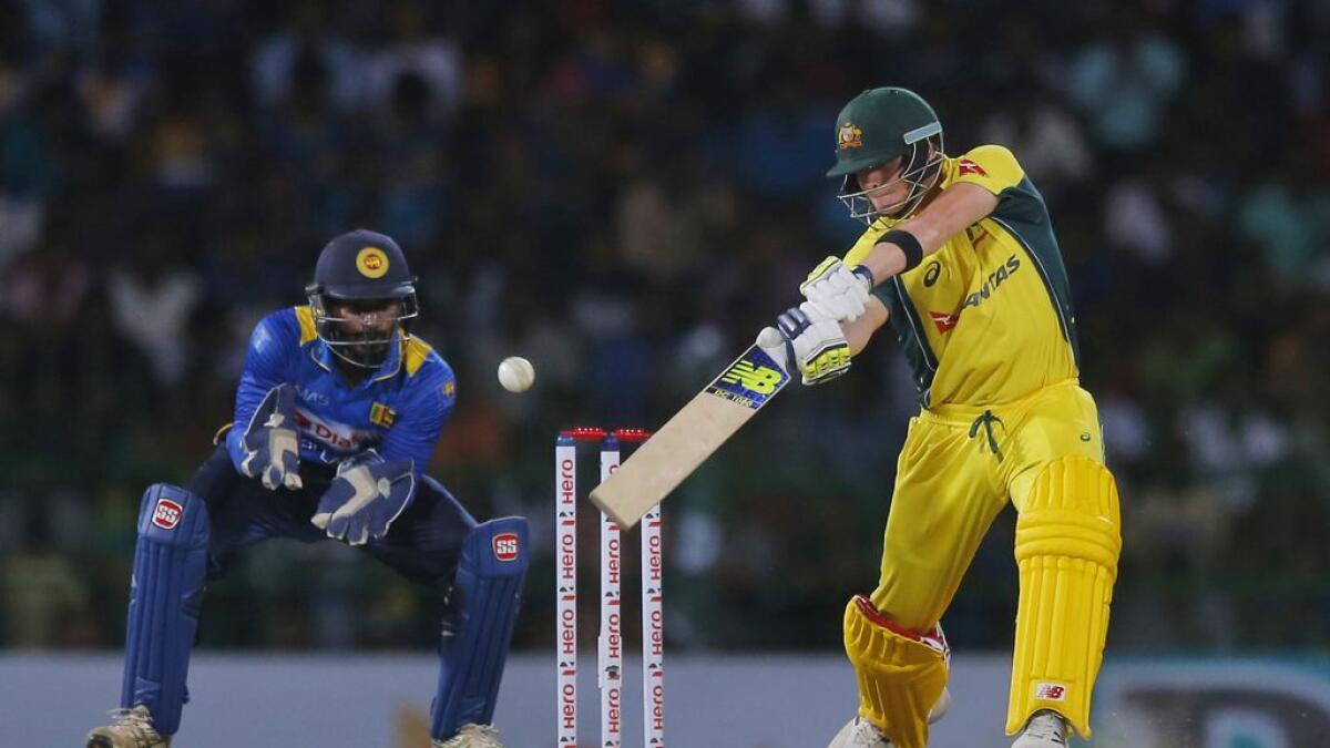 Cricket: Aussies prevail in ODI opener