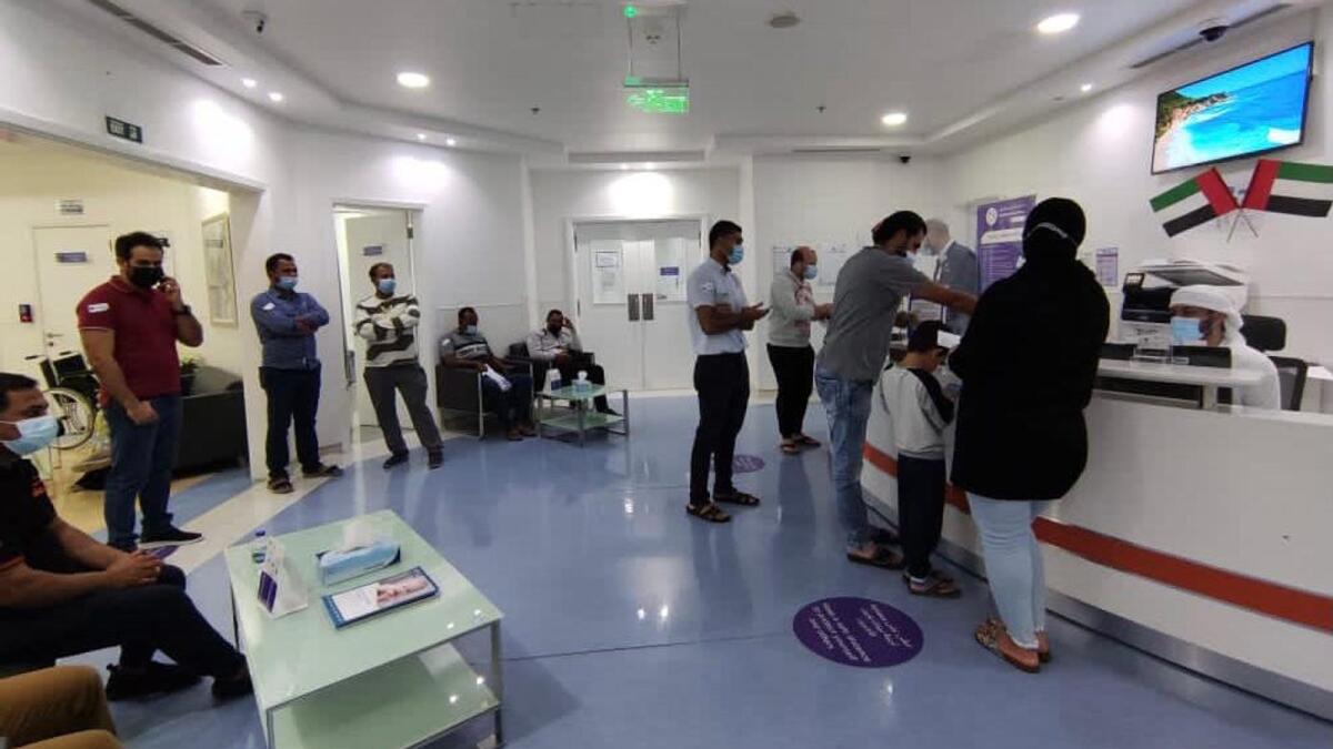 Residents wishing to take the Covid-19 vaccine queue up at Bareen International Hospital in Mohamed Bin Zayed City, Abu Dhabi. — Supplied photos