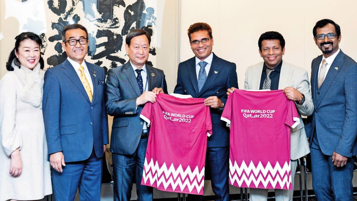 Dr. Junichi Yamada, Executive Vice Chancellor and CEO of Jica launches the FIFA World Cup Qatar 2022 jersey with (left to right) Dr. Satoe Sugie, Director-General, SMI Inc.; Dr. Mitsuaki Sugie, Chairman, SMI Inc.;  Dr. Dennys, President, Dennys World; Dr. Khan and Dr. Anil Mathew.