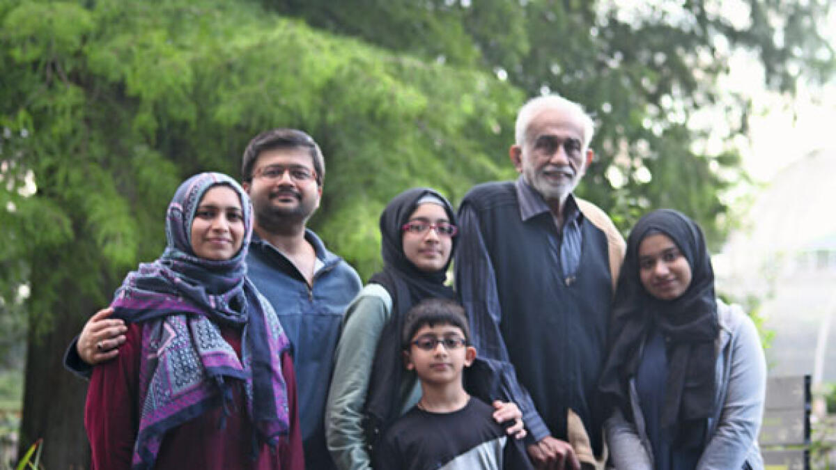 PATRIARCH: Azad Ali (second from right) with his son’s family