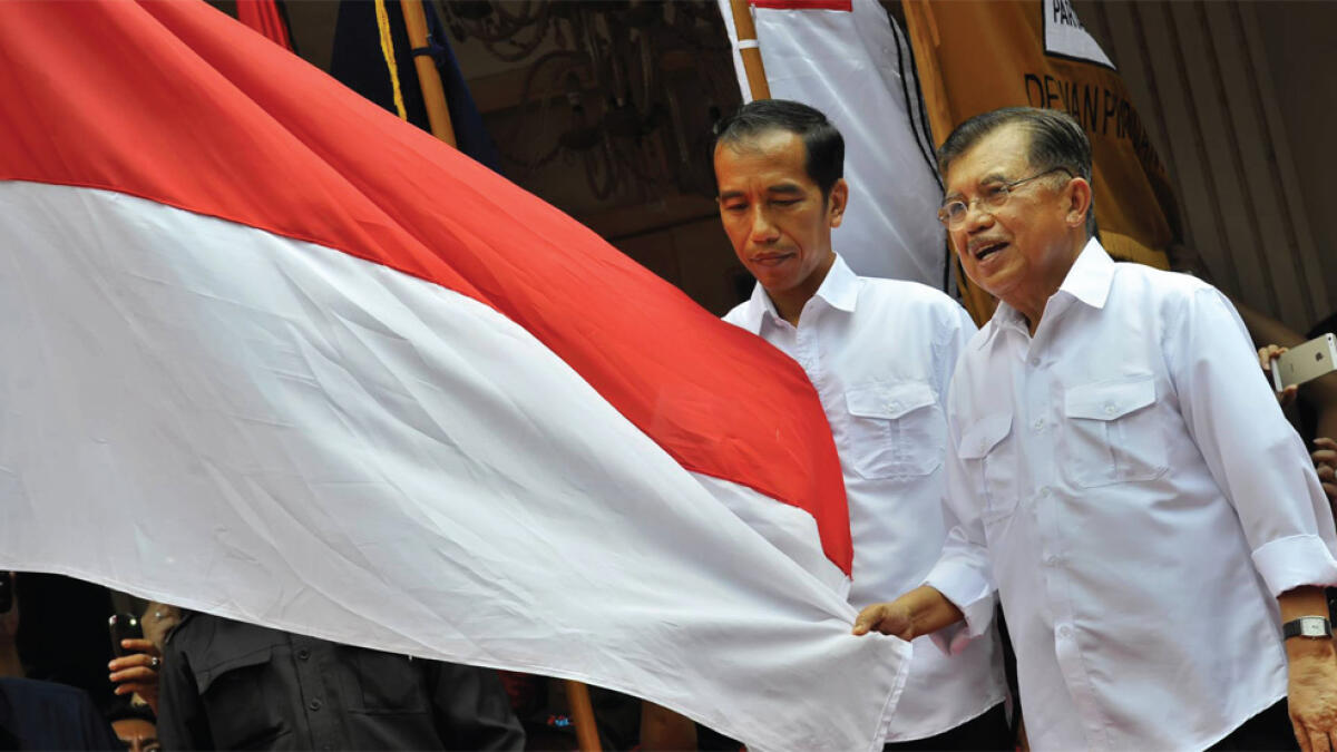 The new President of Indonesia Joko Widodo with Vice President Mohammad Jusuf Kalla