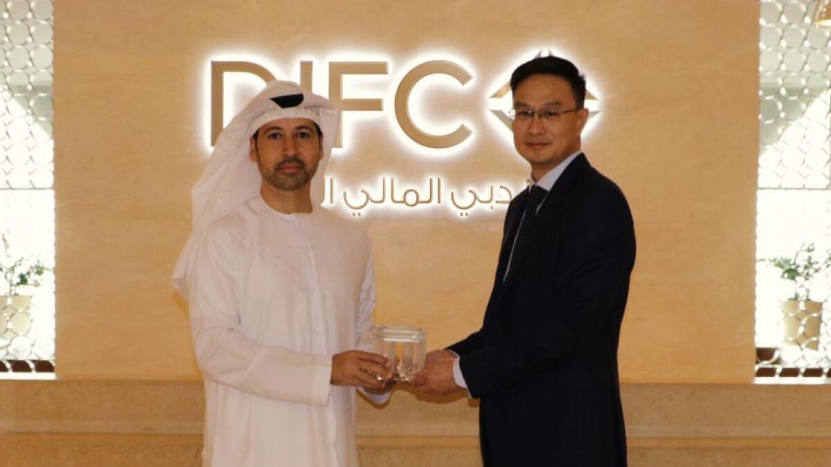 Arif Amiri, CEO of DIFC Authority and Chengzhong Liang, Chief Representative of SGCC Middle East Representative Office. — Supplied photo