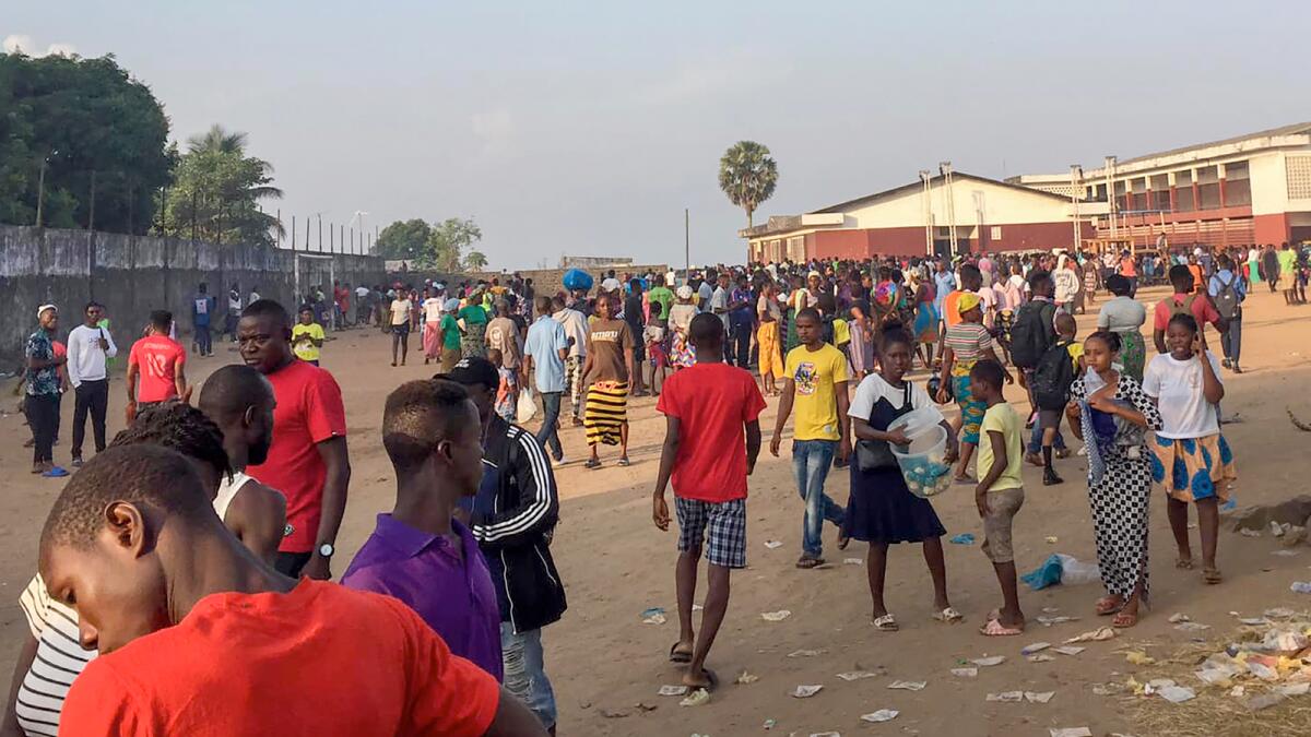 People gathered outside Redemption Hospital, in Monrovia where victims of a stampede were taken to. – AP