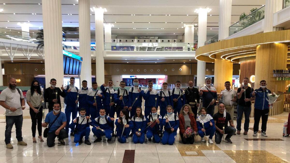 Members of the Israel Swimming Association and Sakhnin Swimming School at the Dubai International Airport on Tuesday. — Supplied photo