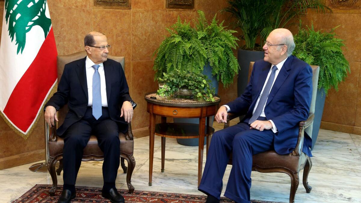 Lebanese President Michel Aoun (left) meeting with prime minister designate Najib Mikati in Beirut. Photo: AFP