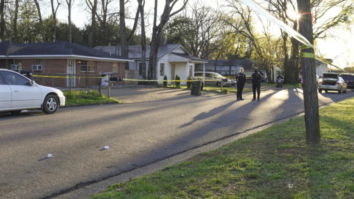 Police cordon off a shooting site where two people including a 2-year-old were killed in Tuscaloosa, Alabama. — AP