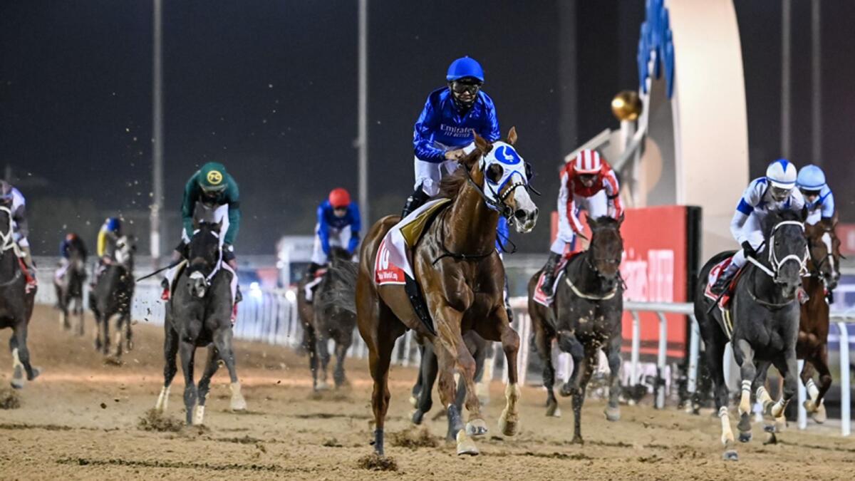 Mystic Guide, ridden by Luis Saez, sprints to glory in the Dubai World Cup at the Meydan racecourse. — Photo by M. Sajjad