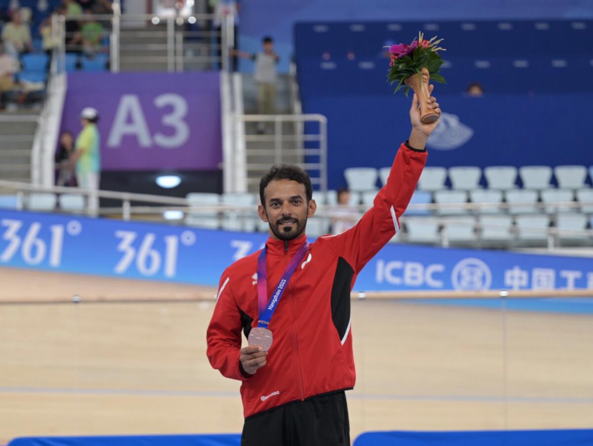 Ahmed Al Mansouri of the UAE celebrates on the podium. — X