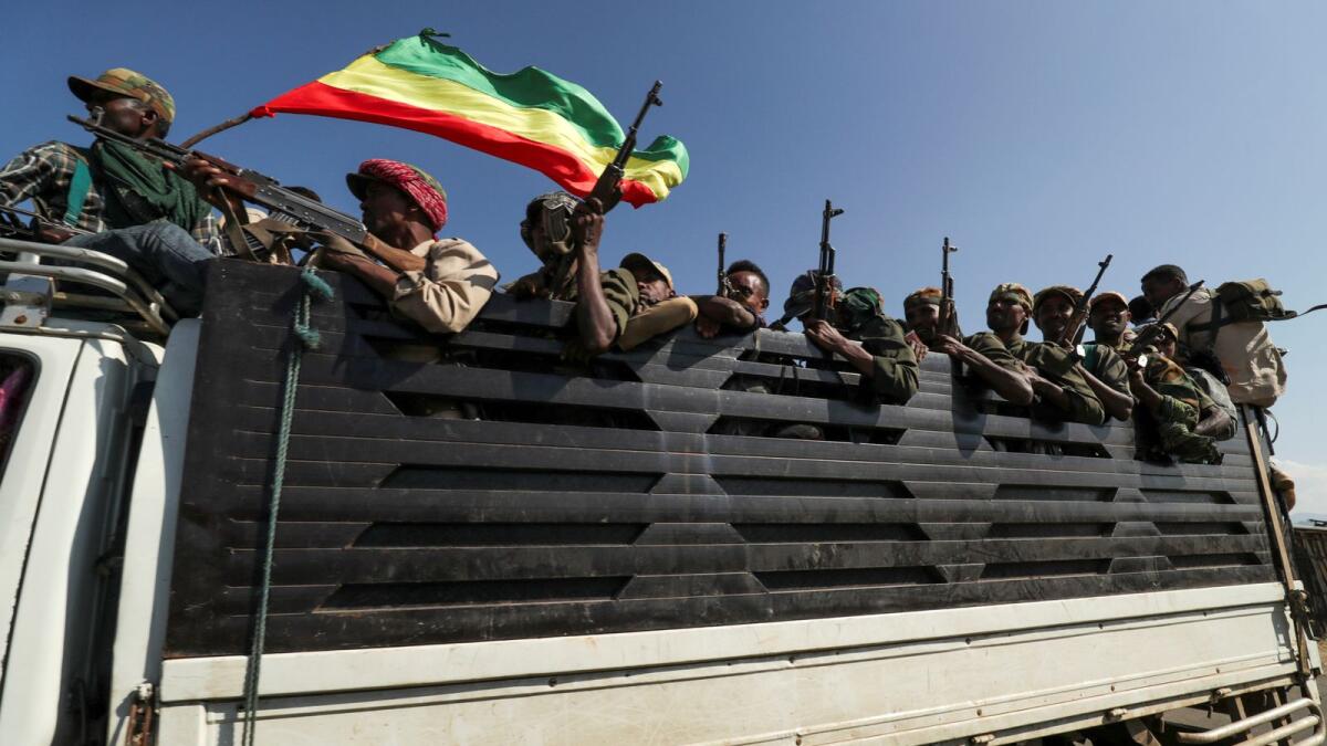 Members of Amhara region militias head to face the Tigray People's Liberation Front, in Sanja, Amhara region near a border with Tigray, Ethiopia, on November 9, 2020.