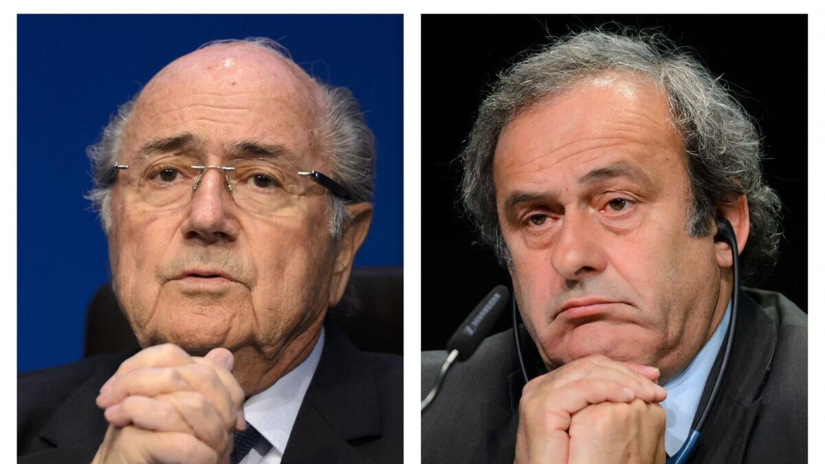 Former Fifa president Sepp Blatter (left) and former Uefa president Michel Platini. — AFP